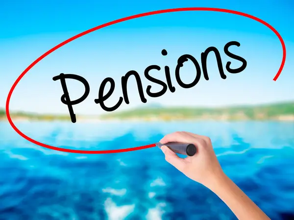Woman Hand Writing Pensions with a marker over transparent board — Stock Photo, Image