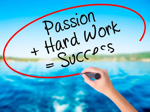 Woman Hand Writing Passion  Hard Work  Success with a marker o