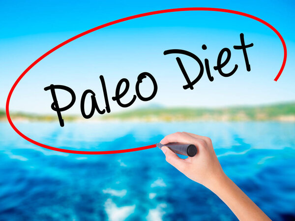 Woman Hand Writing Paleo Diet with a marker over transparent boa