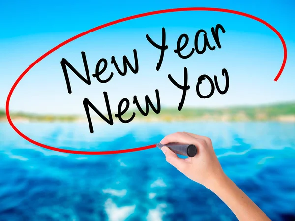 Nő kézzel írás új év új Ön-val egy marker felett átláthatós — Stock Fotó