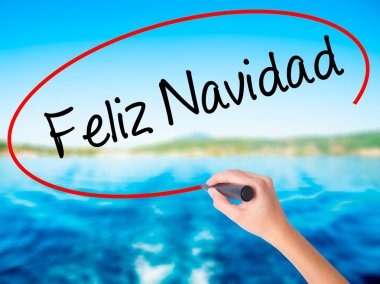 Kadın el Feliz Navidad (İspanyolca Merry Christmas) w yazma