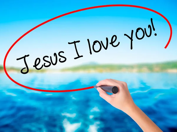 Жінка руки написання Ісуса, я люблю тебе! з маркером над прозорі проJ — стокове фото