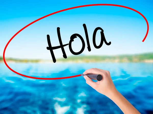 Woman Hand Writing Hola (Hello en español) con un marcador sobre t — Foto de Stock