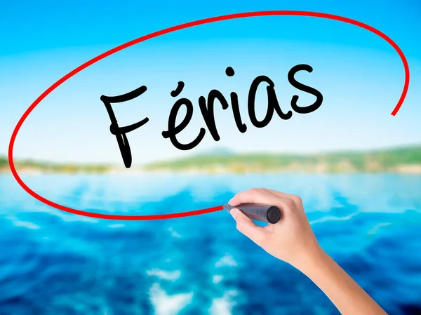 Kobieta ręka piśmie Ferias (wakacje w Portugalii) z ma — Zdjęcie stockowe