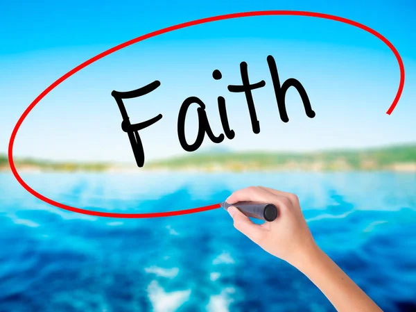 Woman Hand Writing Faith with a marker over transparent board — Stock Photo, Image