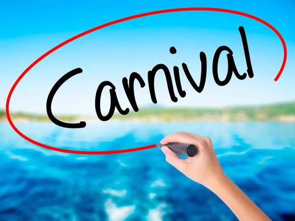 Woman Hand Writing Carnival with a marker over transparent board — Stock Photo, Image