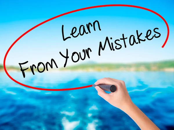 Woman Hand Writing Learn From Your Mistakes  with a marker over — Stock Photo, Image