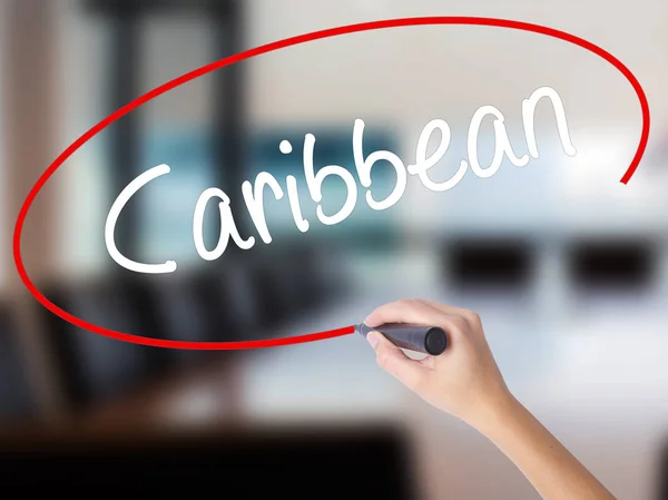 Kobieta ręka piśmie Karaibów z znacznik nad przezroczyste Dzik — Zdjęcie stockowe