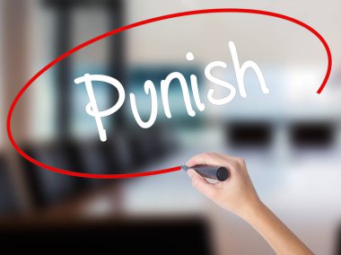 Woman Hand Writing Punish with a marker over transparent board. clipart