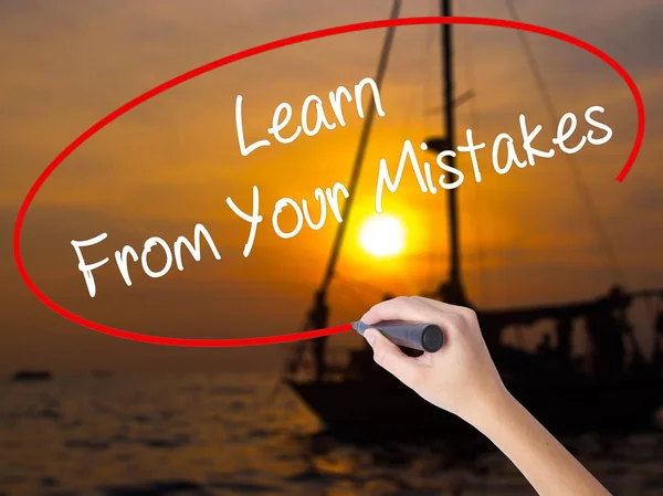 Woman Hand Writing Learn From Your Mistakes  with a marker over — Stock Photo, Image