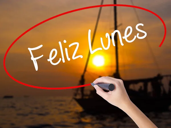 Woman Hand Writing Feliz Lunes (Happy Monday In Spanish) with a — Stock Photo, Image