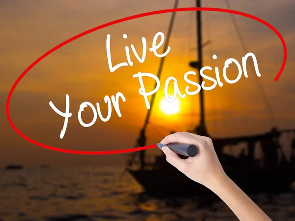 Woman Hand Writing  Live Your Passion with a marker over transpa