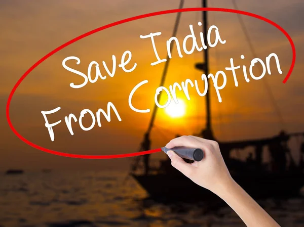 Woman Hand Writing Save India From Corruption with a marker over