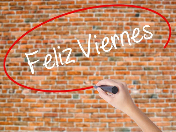 Žena ručně psaného textu Feliz Viernes (šťastný pátek ve španělštině) s — Stock fotografie