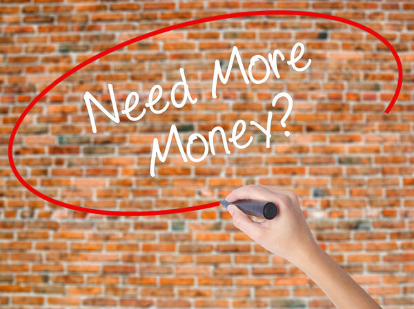 Woman Hand Writing Scope with a marker over transparent board 