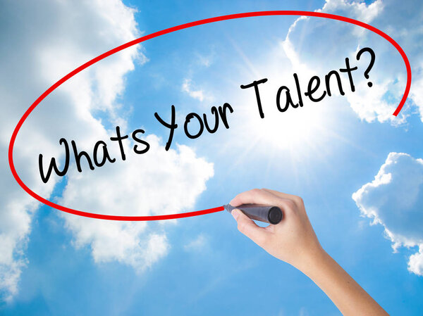 Woman Hand Writing Whats Your Talent? with black marker on visua