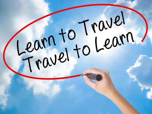 Woman Hand Writing Learn to Travel