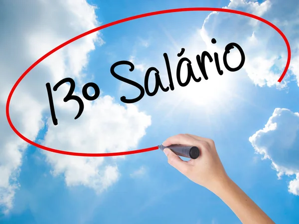 Woman Hand Writing 13 Salary (13o salario In Portuguese)  with b