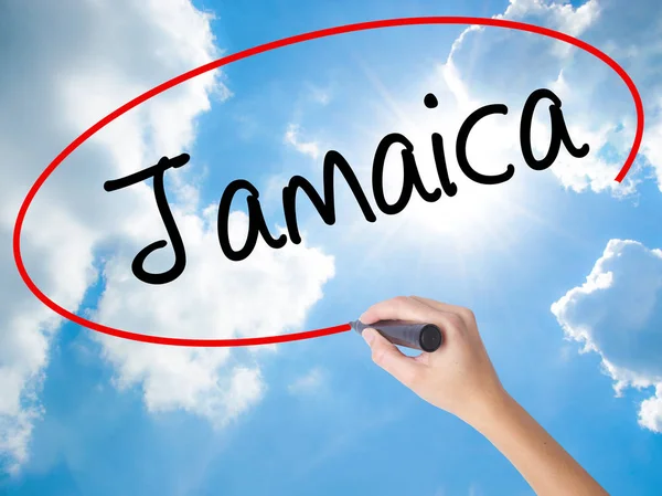 Kvinna Hand skrivande Jamaica med svart markering på visuella skärm — Stockfoto