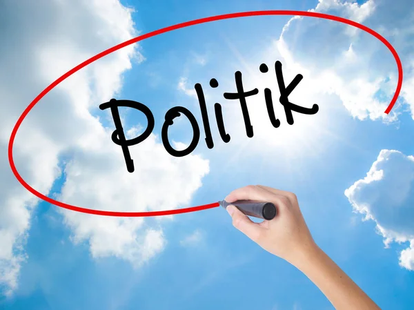 Woman Hand Writing Politik (Politics in German) with black marke