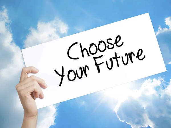 Choose your Future Sign on white paper. Man Hand Holding Paper w