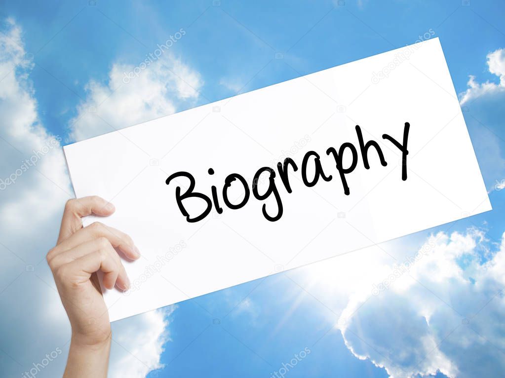 Biography  Sign on white paper. Man Hand Holding Paper with text