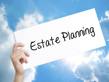 Estate Planning Sign on white paper. Man Hand Holding Paper with clipart