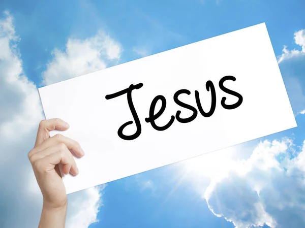 Jesus Sign op wit papier. Man Hand Holding papier met tekst. Is — Stockfoto