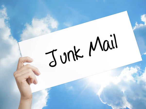 Junk Mail Sign on white paper. Man Hand Holding Paper with text. — Stock Photo, Image