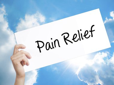Pain Relief Sign on white paper. Man Hand Holding Paper with tex clipart