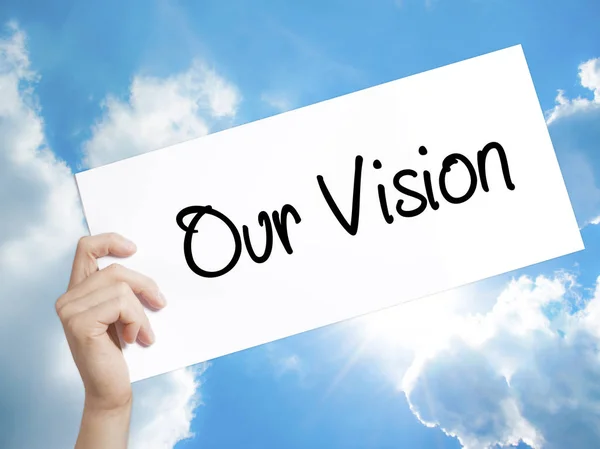 Our Vision Sign on white paper. Man Hand Holding Paper with text