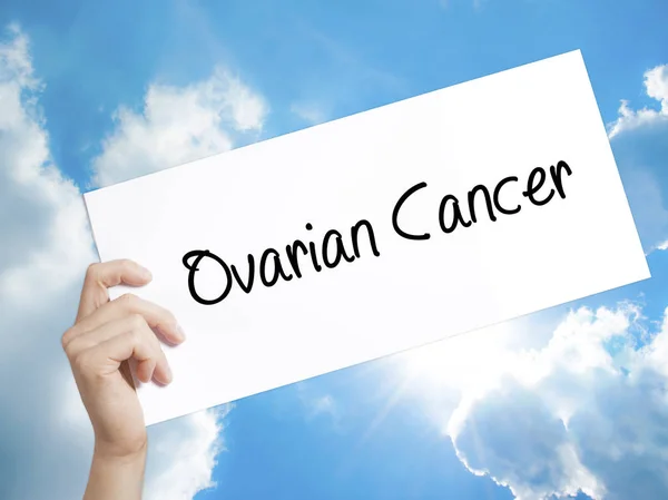 stock image Ovarian Cancer Sign on white paper. Man Hand Holding Paper with 