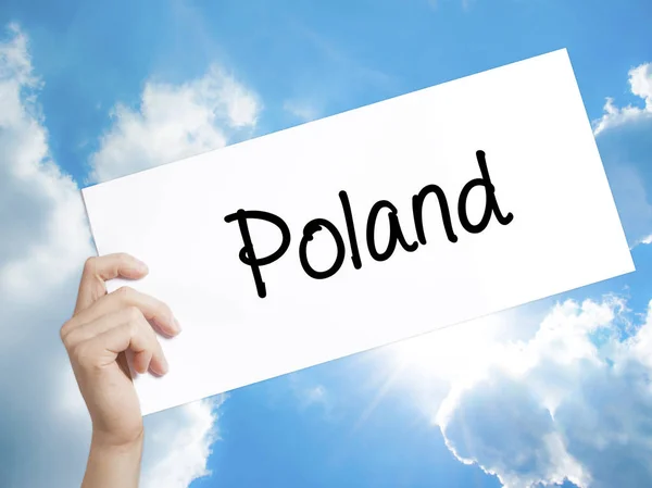 Pologne Signez sur le livre blanc. Man Hand Holding Paper avec texte. I — Photo