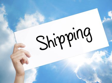 İşareti beyaz kağıt üzerine nakliye. Holding adam el kağıt metinle. 