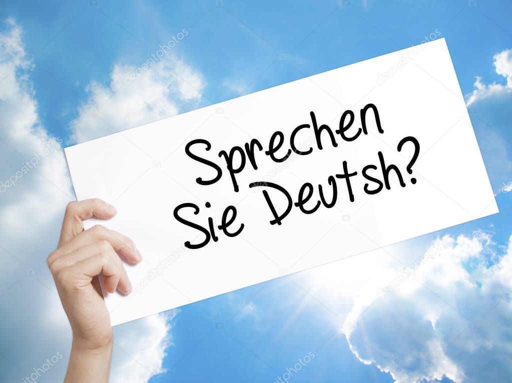 Do You Speak German? (in German) Sign on white paper. Man Hand H