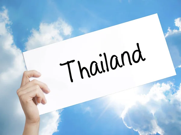 Thailand  Sign on white paper. Man Hand Holding Paper with text. — Stock Photo, Image