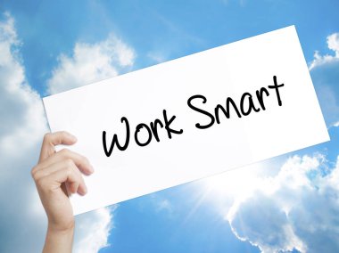 Work Smart Sign on white paper. Man Hand Holding Paper with text clipart