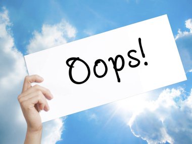 Oops! Beyaz kağıt üzerine oturum açın. Adam el Holding Kağıt metin. ISO