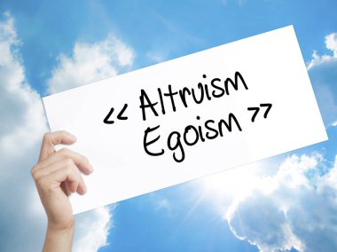 Fedakarlık - bencillik tabelada beyaz kağıt. Adam el Holding Kağıt wi