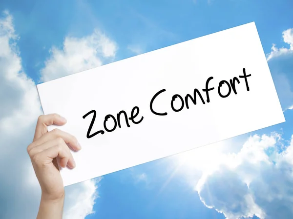 Zone Comfort Sign on white paper. Man Hand Holding Paper with te