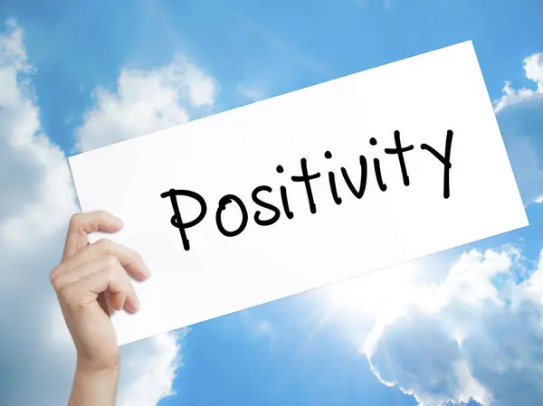 Positivity Sign on white paper. Man Hand Holding Paper with text — Stock Photo, Image