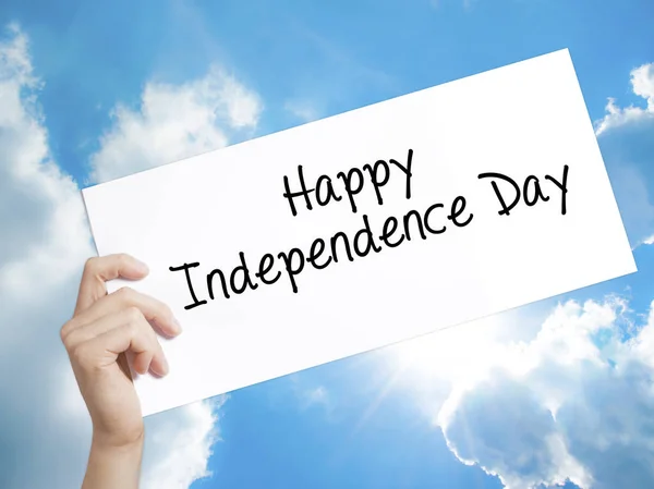 happy Independence Day Sign on white paper. Man Hand Holding Pap