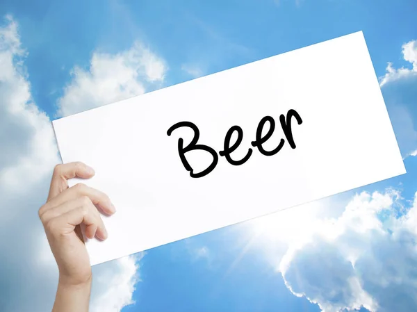 Beer Sign on white paper. Man Hand Holding Paper with text. Isol