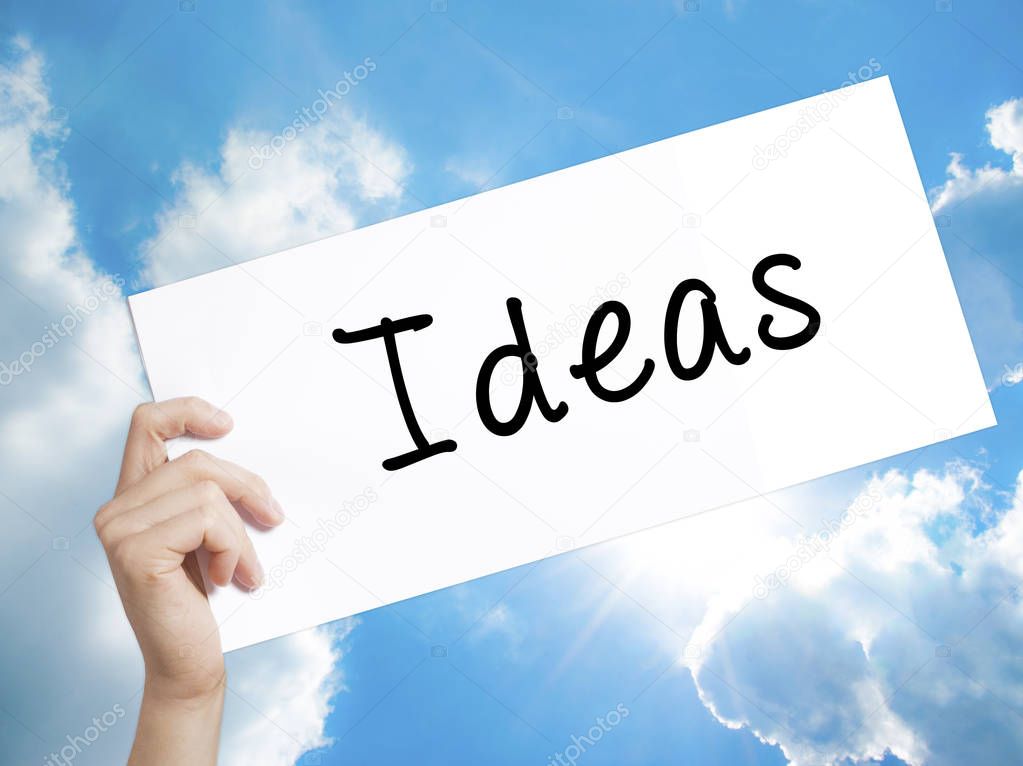 Ideas Sign on white paper. Man Hand Holding Paper with text. Iso