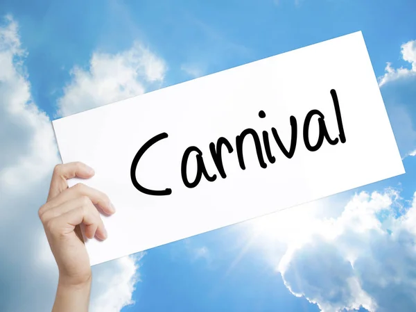 Carnival Sign on white paper. Man Hand Holding Paper with text.