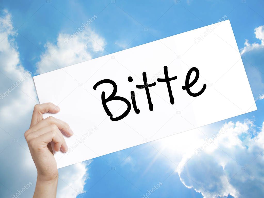 Bitte (Please in German) Sign on white paper. Man Hand Holding P