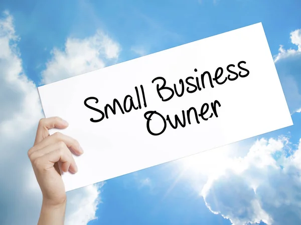 Small Business Owner Sign on white paper. Man Hand Holding Paper