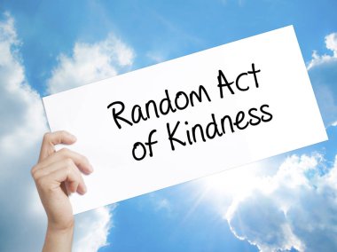 Random Act of Kindness Sign on white paper. Man Hand Holding Pap clipart