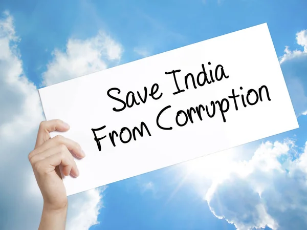 Save India From Corruption Sign on white paper. Man Hand Holding