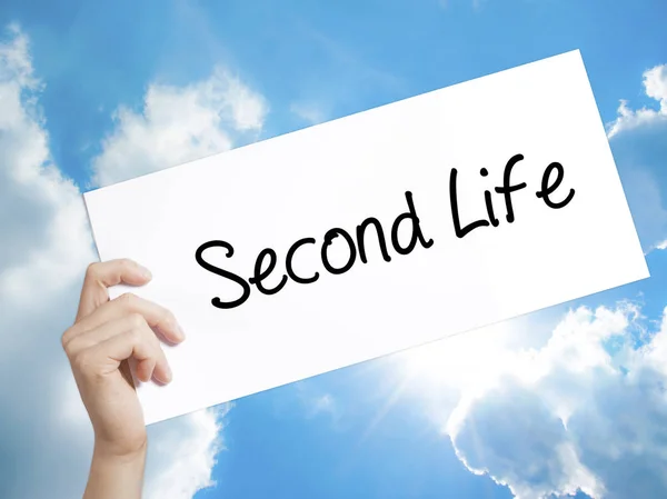 Second Life Sign on white paper. Man Hand Holding Paper with tex